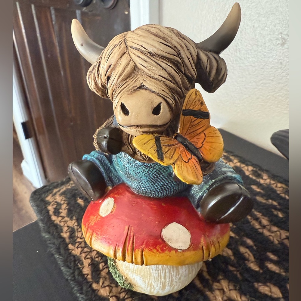 Highland Cow Figurine on Mushroom with Butterfly